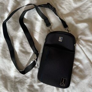 TravelPro // soft crossbody with United logo